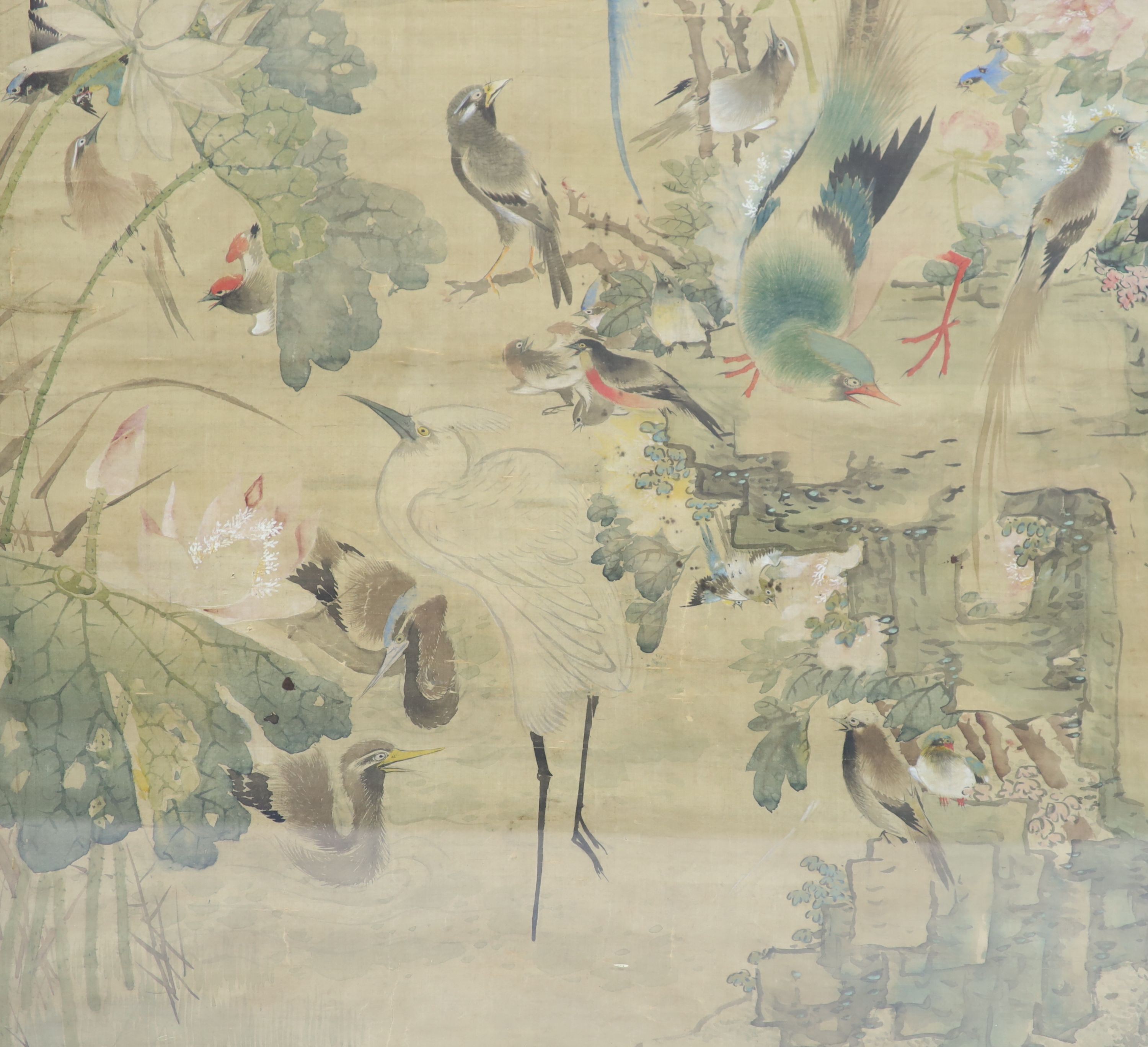 A large Chinese painting on silk of ‘The Hundred Birds’, late Qing dynasty, 161.5 cm x 91 cm including brocade border